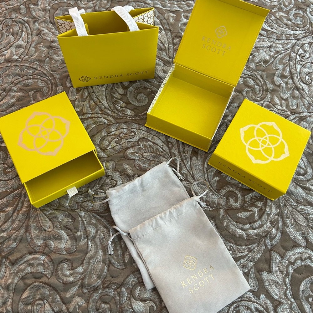 Kendra Scott Three Yellow Gift Boxes, One Bag, and Two Pouches